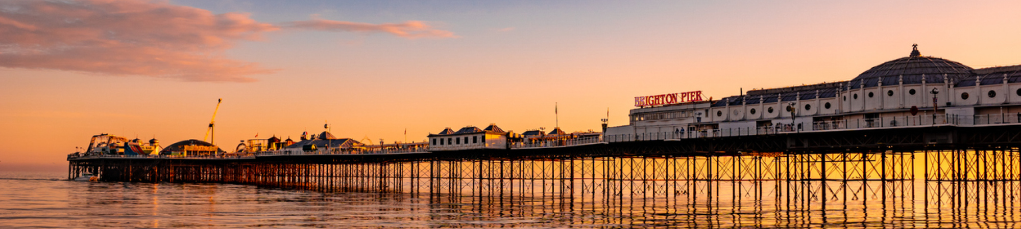 View of Brighton pier from beach